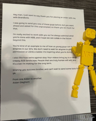 A yellow BrandBot delivered with a personal letter